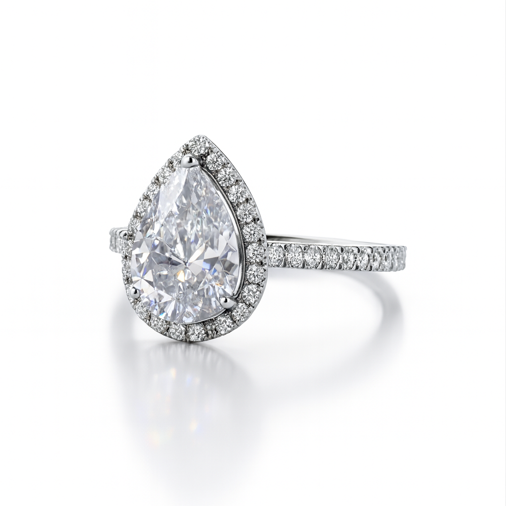 Pear shape halo pave ring